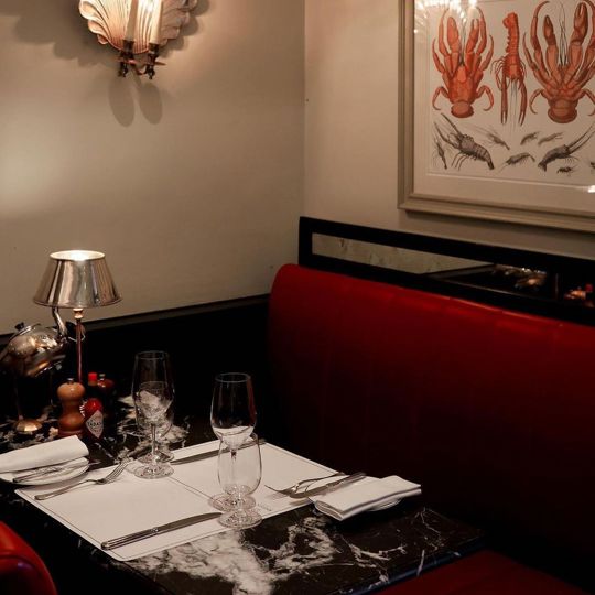table laid at Bentley's Oyster Bar & Grill seafood restaurant in Mayfair, London